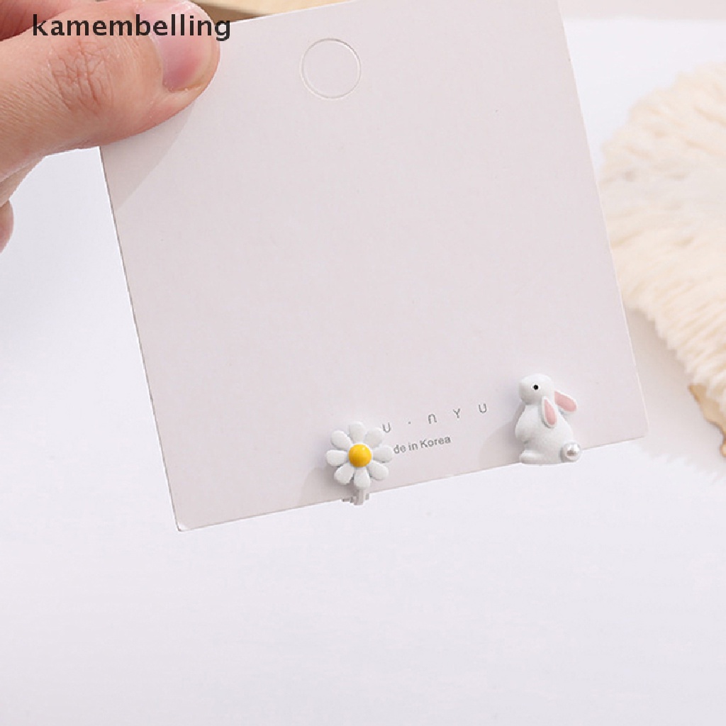 1 Đôi Khuyên Tai Hình Thỏ Trắng Và Hoa Mini Dễ Thương Cho Nữ