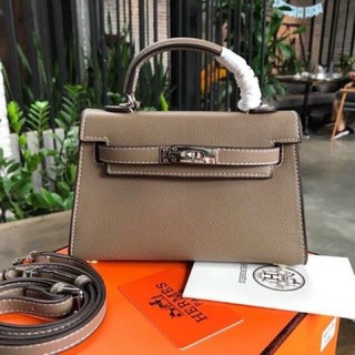 Túi H 19cm khuy tag bạc