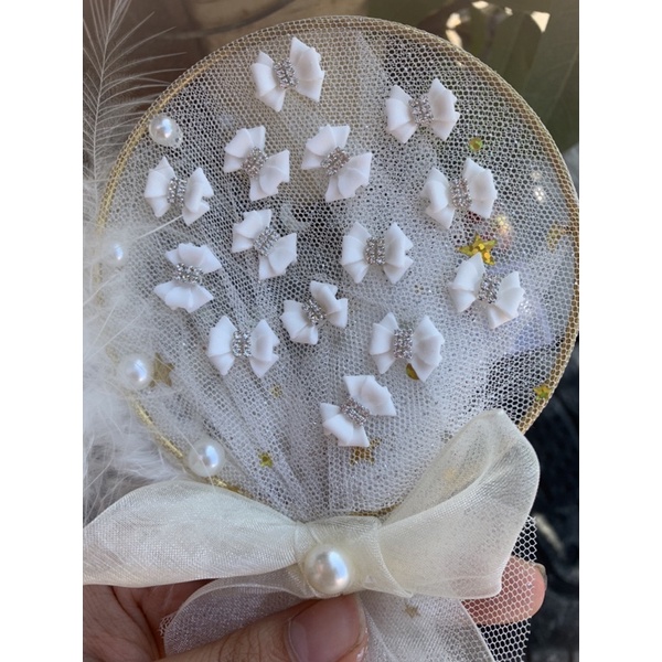Nơ bột nail gắn móng chân