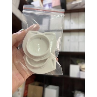 Nắp nối cup Imani với máy dây.