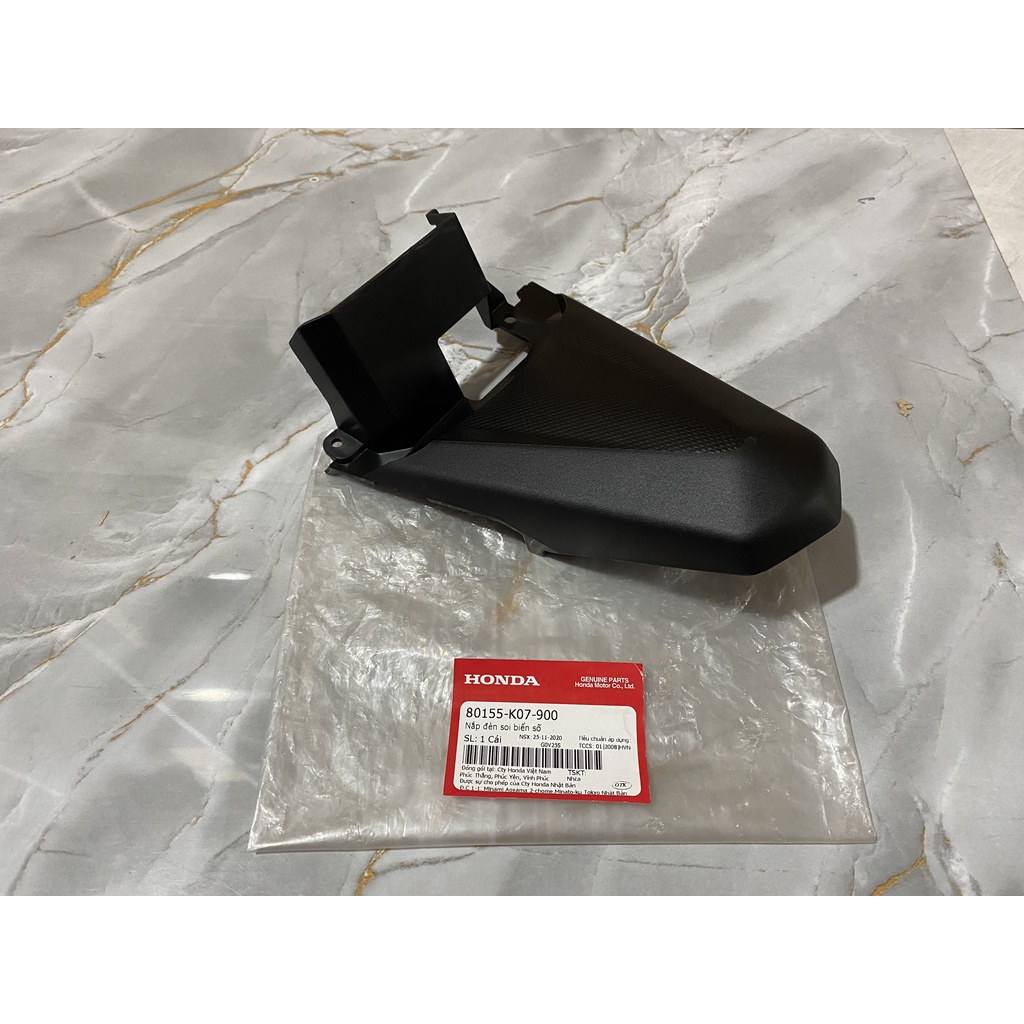 Nắp đèn soi biển số HONDA WAVE RSX110 năm 2012-2013. 80155K07900