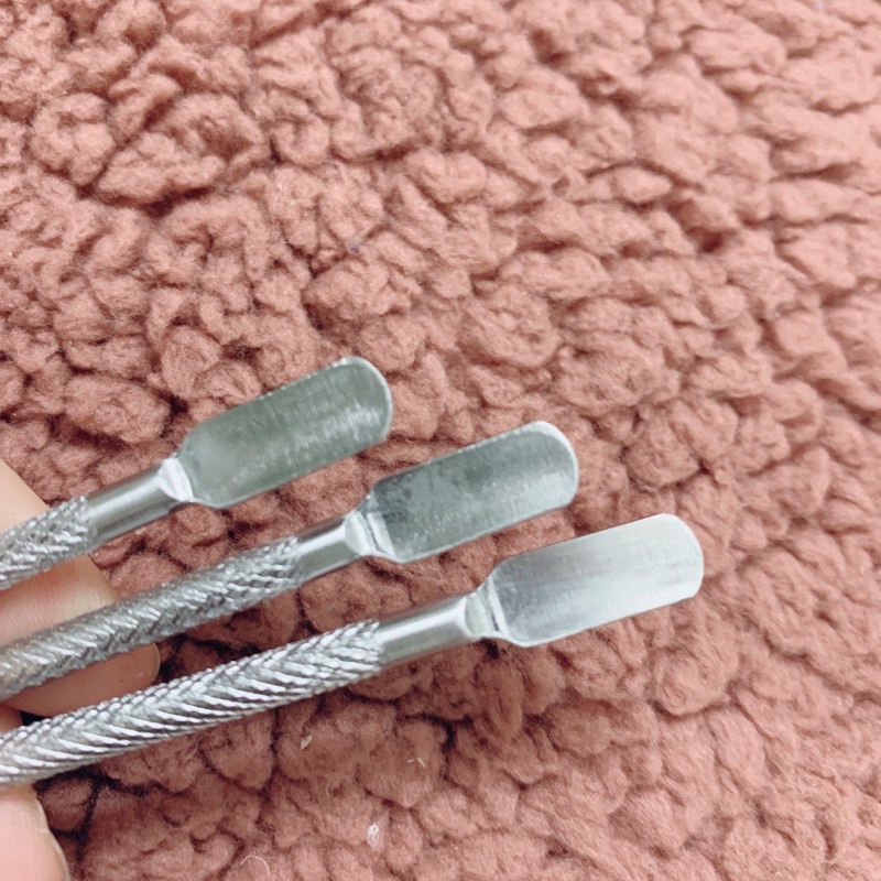 Sủi đẩy da inox, cây đẩy da túi đỏ, cây lấy khóe inox