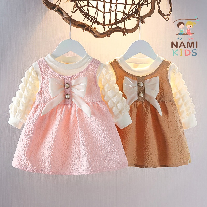 Váy đầm bé gái dài tay nơ ngực họa tiết nổi dễ thương