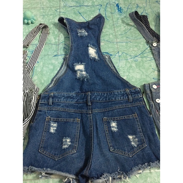 Quần yếm giả váy 45-52kg new 99%