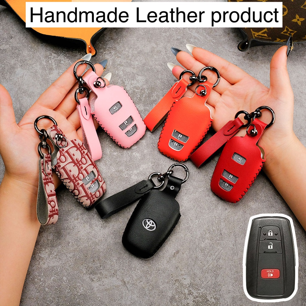 Bao da bọc chìa khóa smartkey xe ô tô Toyota Corolla Cross Camry Altis 2022 2, 3, 4 nút bấm khâu tay móc tròn đen TCR
