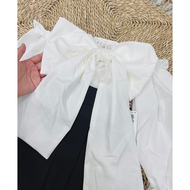 Set chân váy tennis + áo bẹt vai nơ to