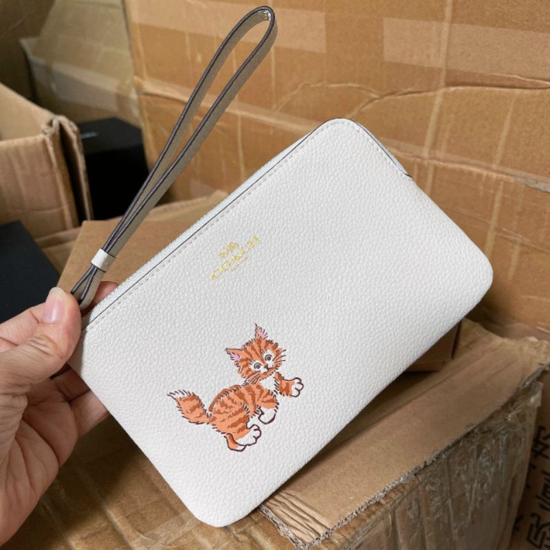 Ví coach đeo cổ tay siêu cưng