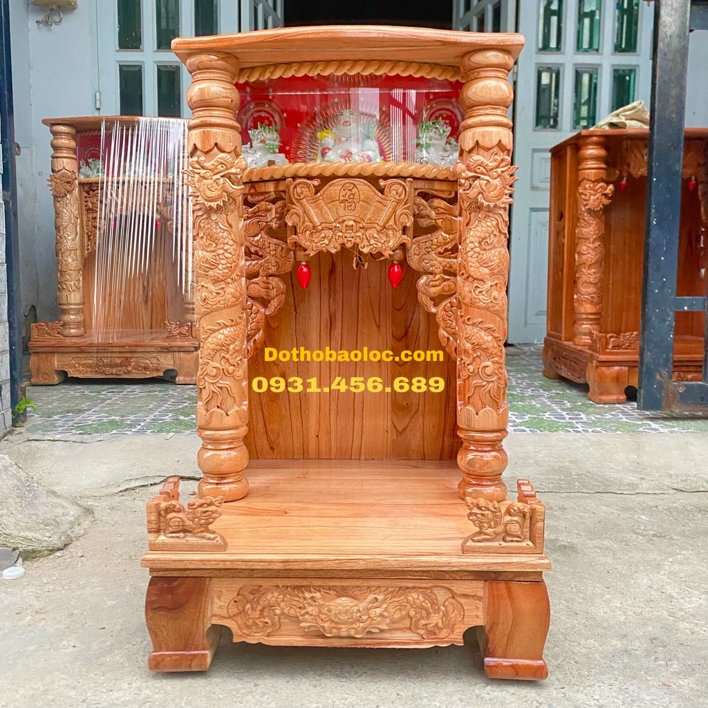 Bàn thờ thần tài ông địa gỗ xoan ngang 48cm quỳ trụ hộp điện tử -Đỏ