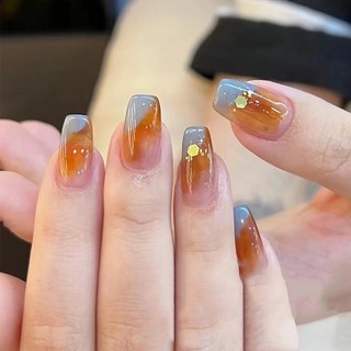 Móng tay giả màu hổ phách thời trang thu đông