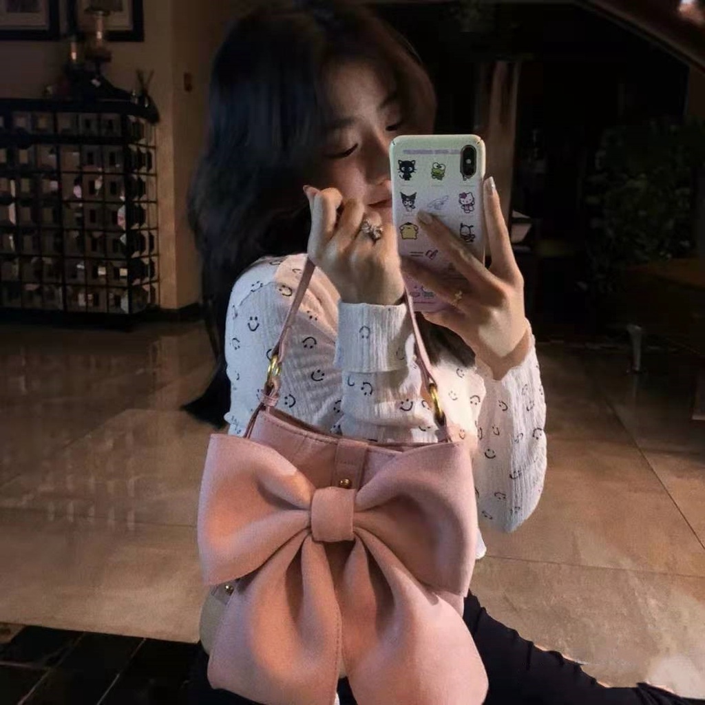 Túi bucket kẹp nách dáng nơ màu hồng pastel chất liệu nhung trơn 6976 - Unip