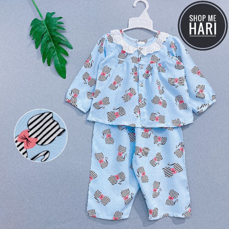 Bộ tole/ lanh tay dài quần dài cài nút giữa