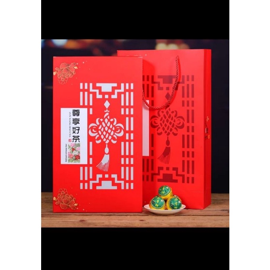 Hộp quà tết trà phổ nhĩ quýt kèm bộ tách trà đất tây thi rất đẹp và sang trọng cho các bạn làm quà biếu tết