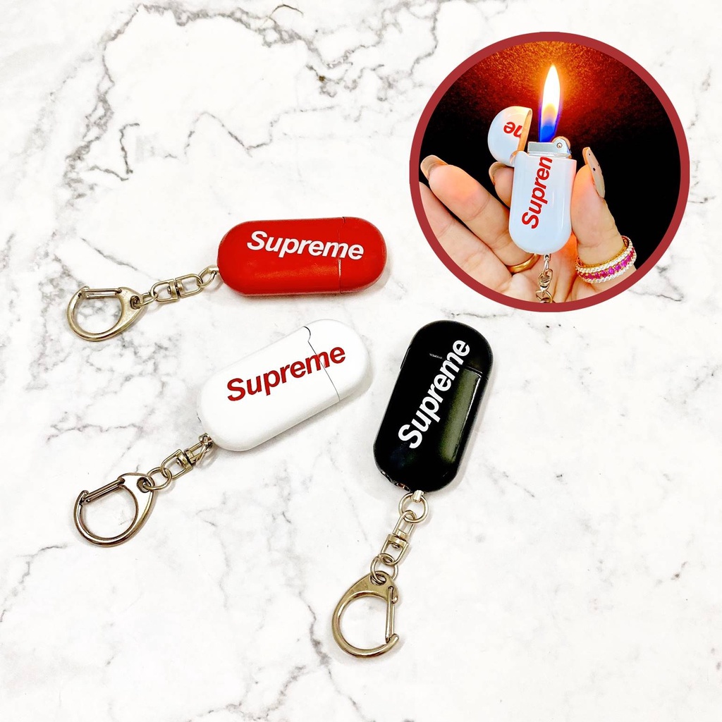 HỎA TỐC - 𝐇ỘT 𝐪𝐮𝐞̣𝐭 𝐁𝐚̣̂𝐭 𝐥𝐮̛̉𝐚 móc khóa SUPREME mini gaz đá rãnh tay - MENZ
