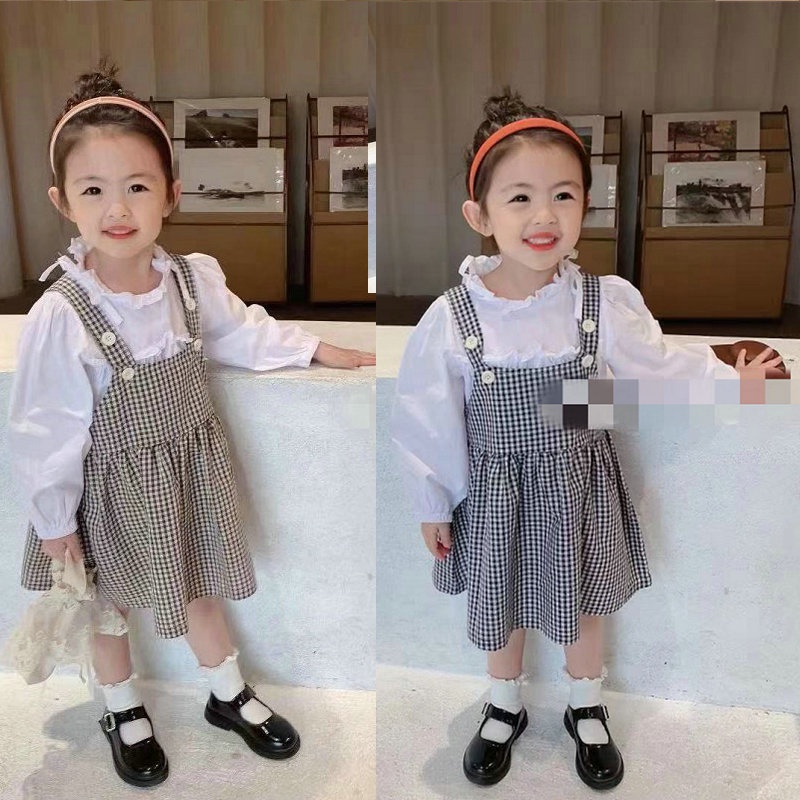 Set Áo Sơ Mi Tay Dài + Chân Váy Yếm Kẻ Sọc Caro Phong Cách Mới Mùa Xuân 21 Cho Bé Gái
