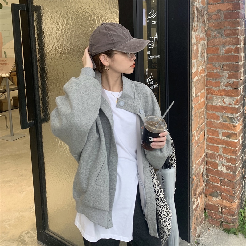 Áo khoác thời trang nữ dài tay cổ bẻ dáng rộng