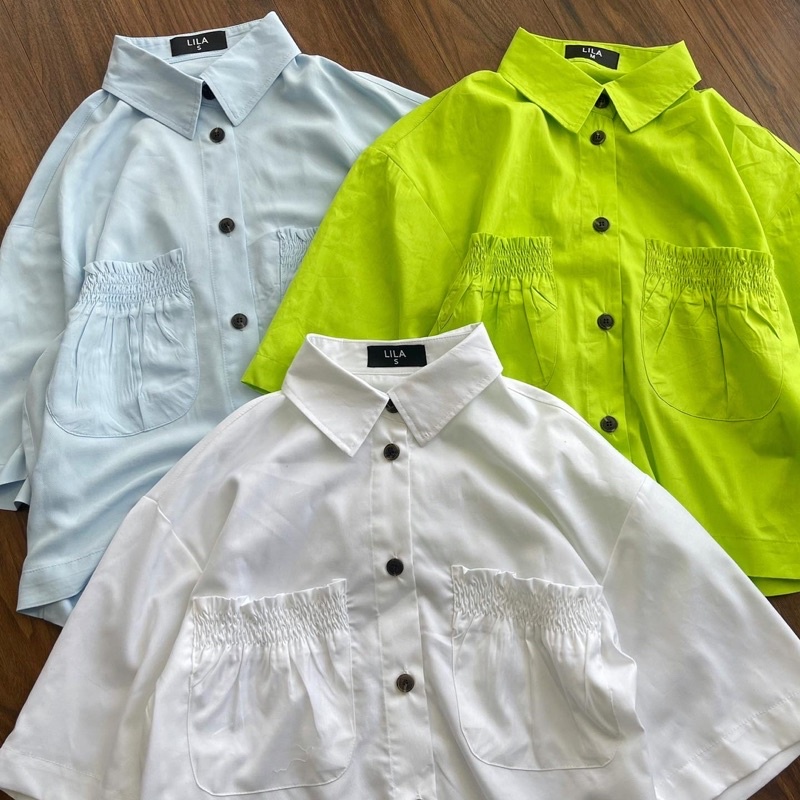 Áo sơmi nữ kiểu vạt ngang cách điệu