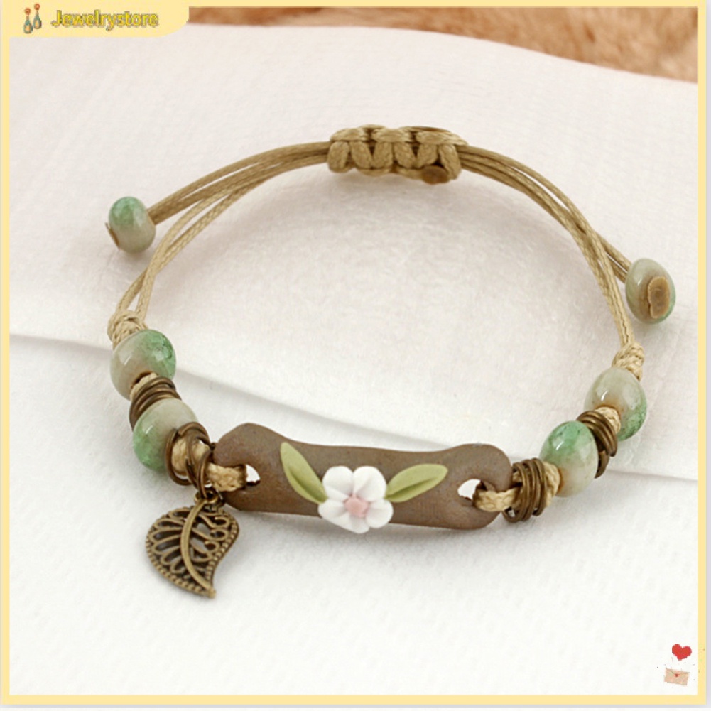 Vòng tay dây bện phối mặt charm gốm hình hoa và lá thời trang cho nữ