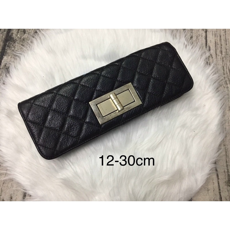 Ví cầm tay da chần