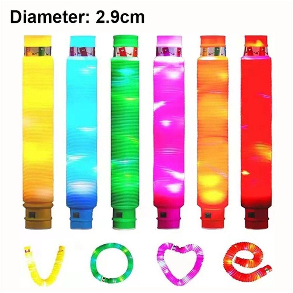 Đồ chơi ống lò xo pop đèn led sáng kéo dài giảm căng thẳng