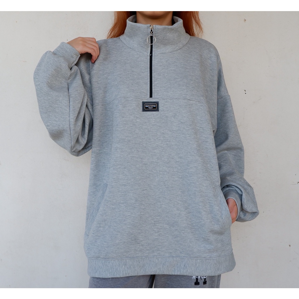 Áo polo nỉ tay dài, cổ cao, khóa kéo dạng khuyên