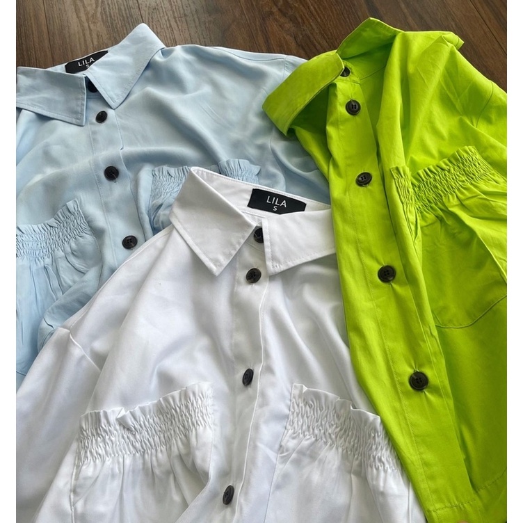 Áo sơmi nữ kiểu vạt ngang cách điệu