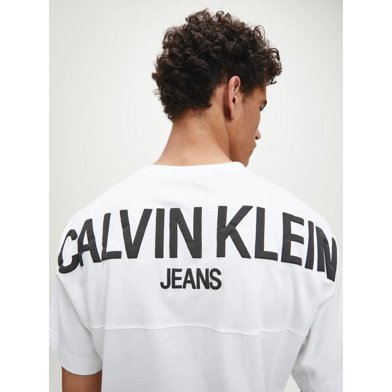 Áo thun tay ngắn Unisex Nam / Nữ in logo to phía mặt sau chính hãng màu trắng vnxk