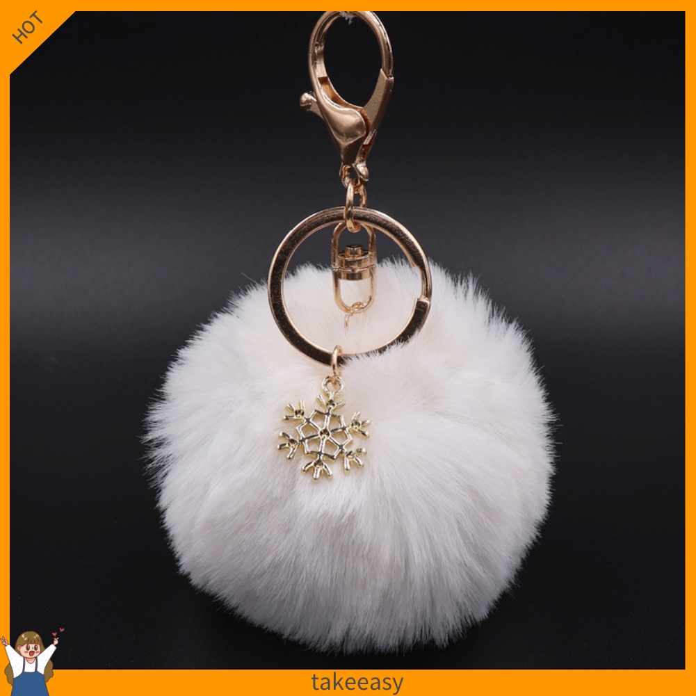 Móc khóa hình bông tuyết đính banh xù dễ thương