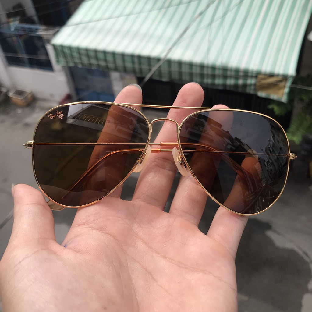 Kính rayban Ý, 2nd, nguyên zin, không thay thế sửa chữa. ẢNH THẬT. chống chói, uv cực tốt. nâu trà đi ngày và đêm