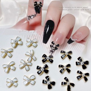 Charm nơ trắng đen nail