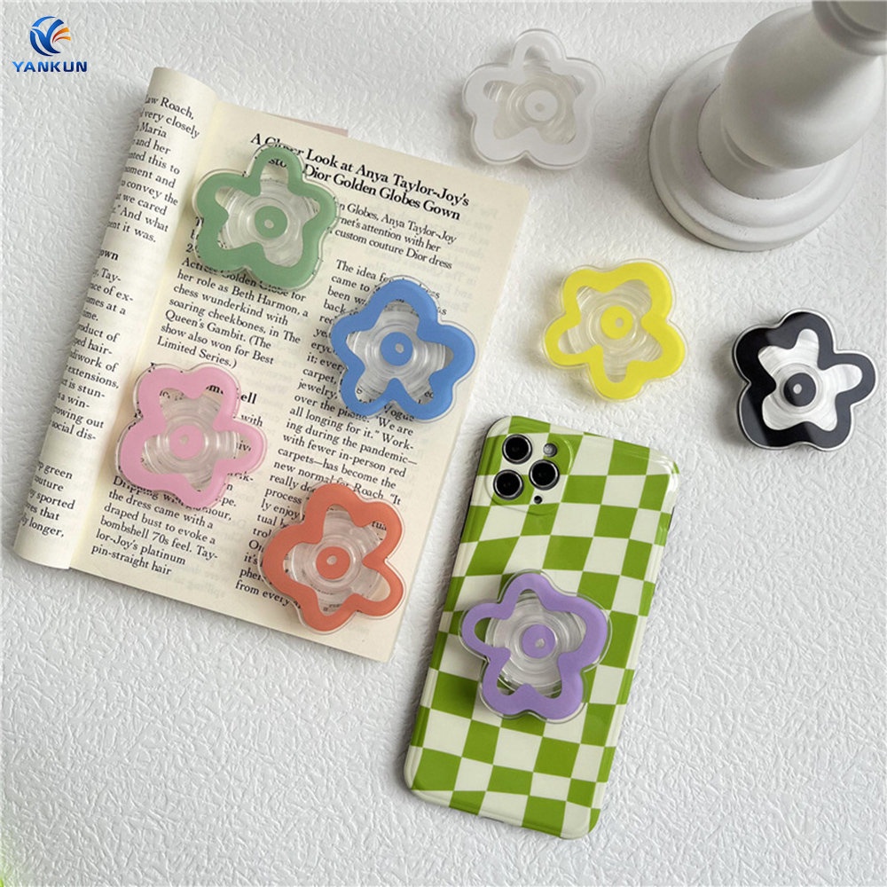 Giá Đỡ Điện Thoại Hình Bông Hoa Thả Keo Dán Để Bàn Có Thể Gập Lại