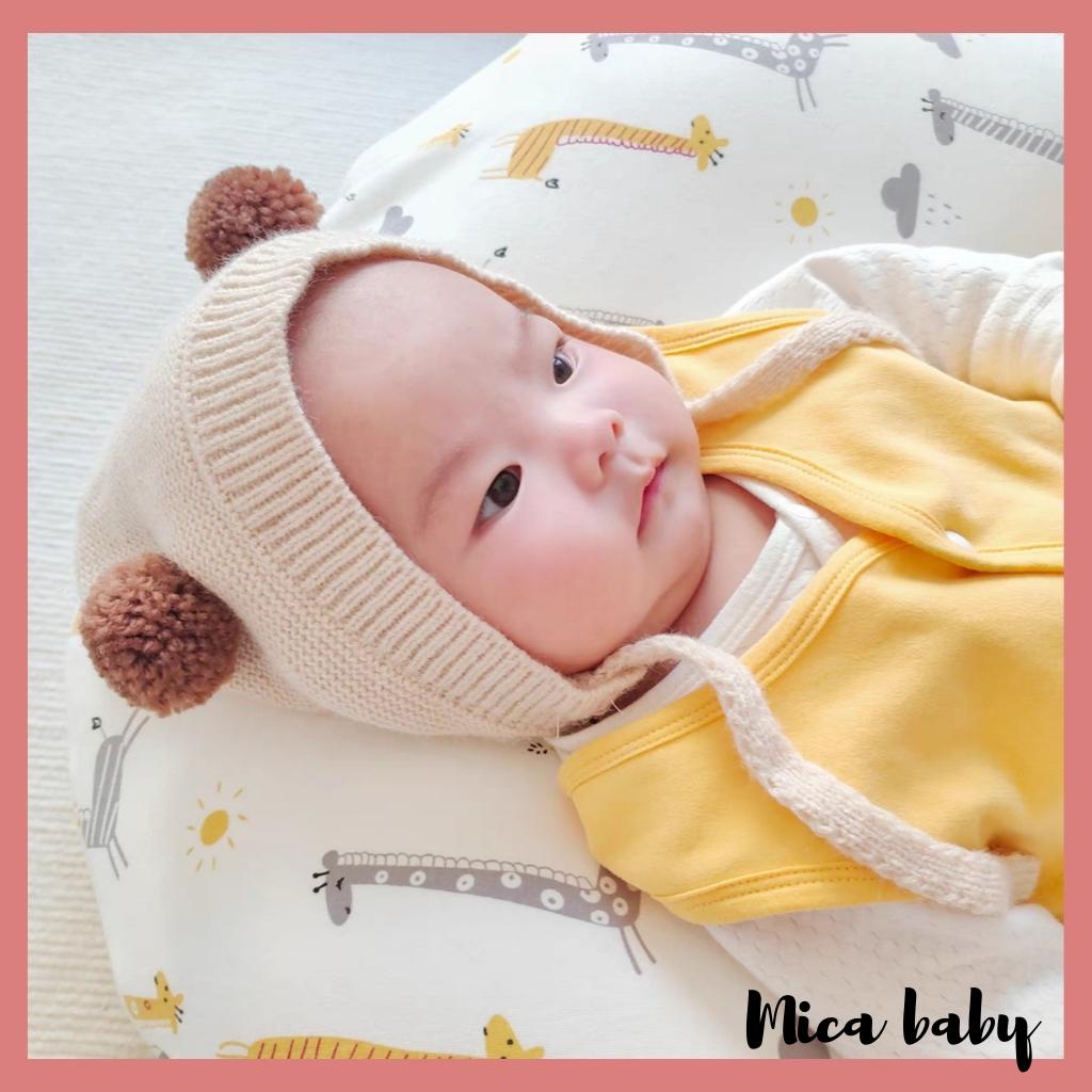 Mũ len màu trơn thiết kế dây buộc đính cục bông thời trang thu đông cho bé ML204 Mica baby
