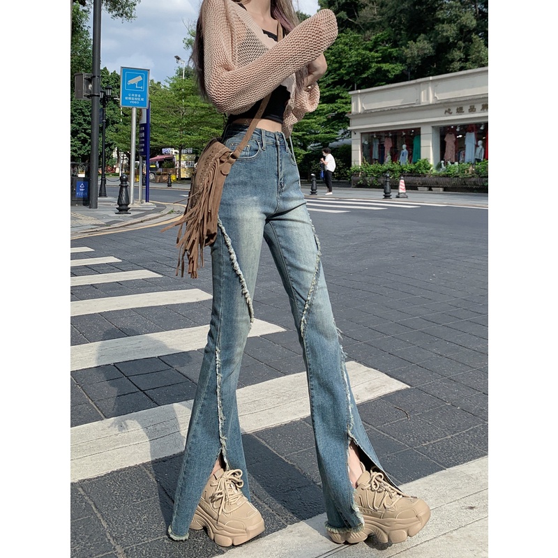 Quần Jean Nữ Ống Loe Xẻ Tà Mới
