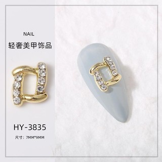 Charm đính móng mã 38