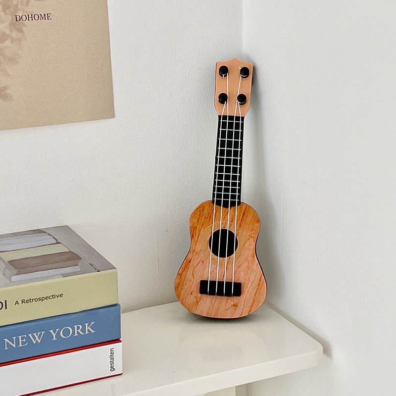 Đồ Chơi Mô Hình Đàn Ukulele Mini Để Bàn Trang Trí Cho Bé