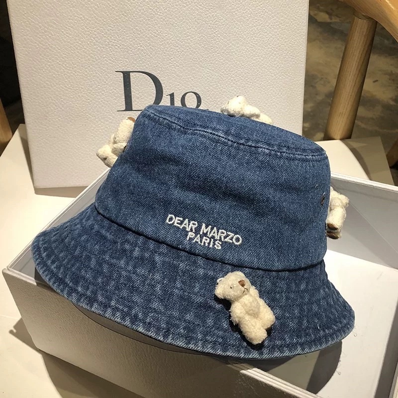 Mũ bucket bò 13de marzo đính gấu bông mai phương bùi