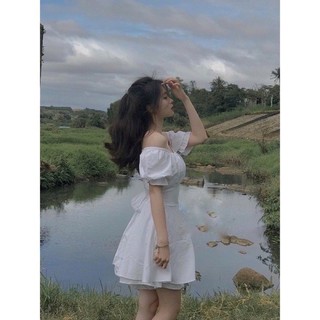 Đầm trắng trễ vai chốt trên live