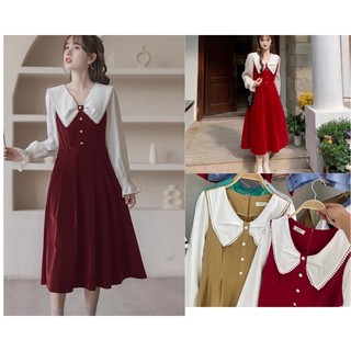 Đầm babydoll vải nhung tăm cúc bọc dài tay