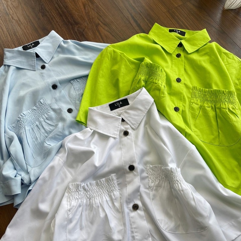 Áo sơmi nữ kiểu vạt ngang cách điệu