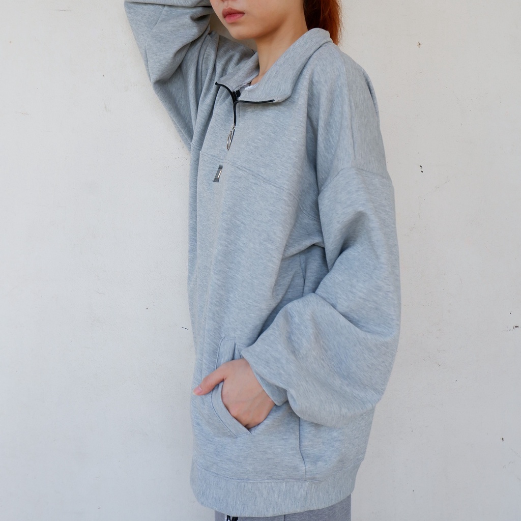 Áo polo nỉ tay dài, cổ cao, khóa kéo dạng khuyên