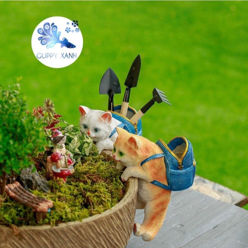 Mô hình chú mèo leo thành bể cá, bể thủy sinh, chậu cây trang trí.