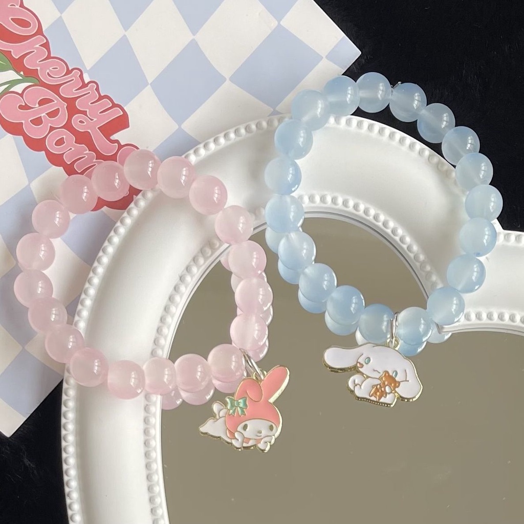 Vòng Tay Chuỗi Hạt Pha Lê Nhân Tạo Mềm Mại Màu Hồng Trong Suốt Hình Chú Chó Cinnamon Melody Dễ Thương Cho Bé Gái