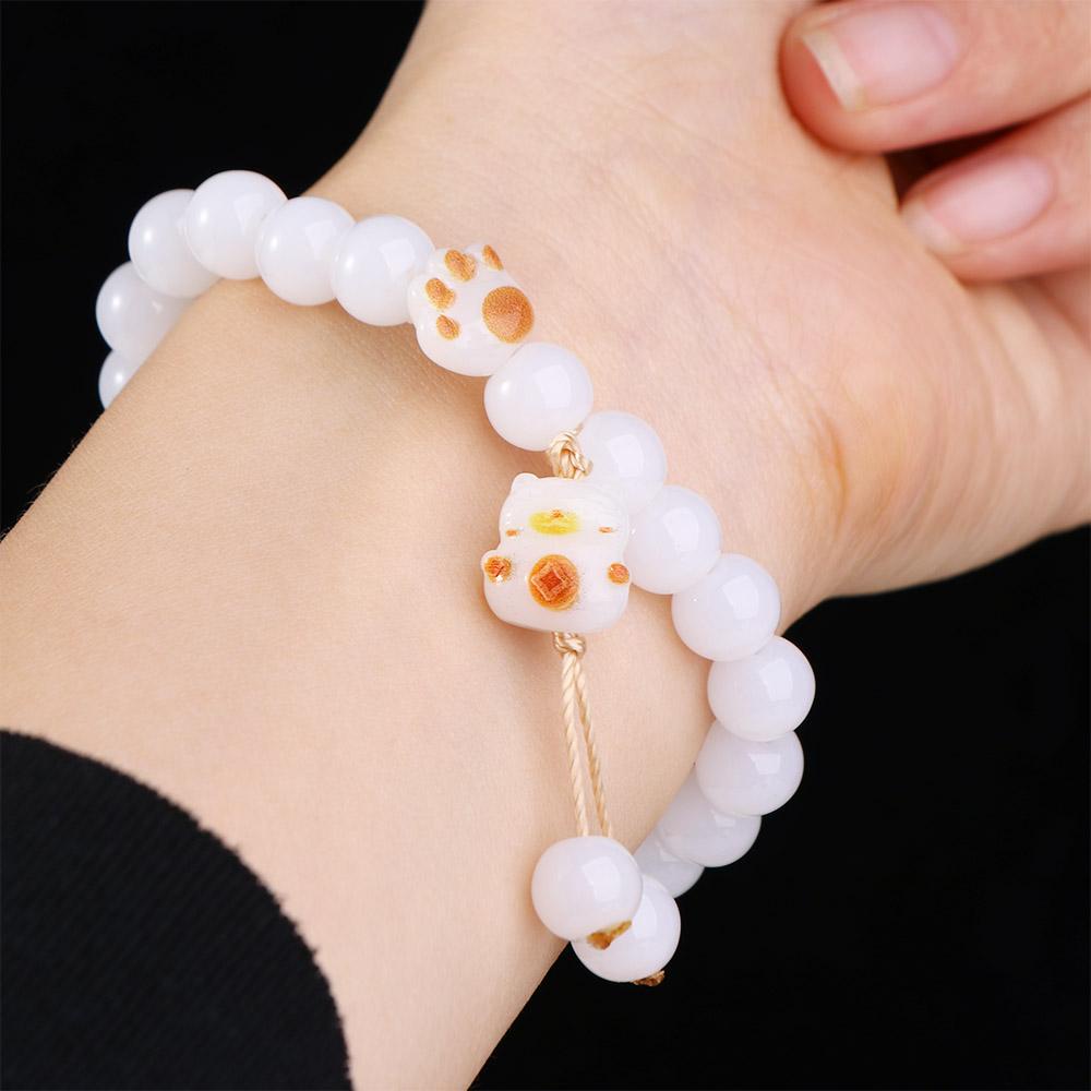 Vòng Đeo Tay Hạt Thủy Tinh Hình Dấu Chân Thỏ Dễ Thương Dành Cho Nữ