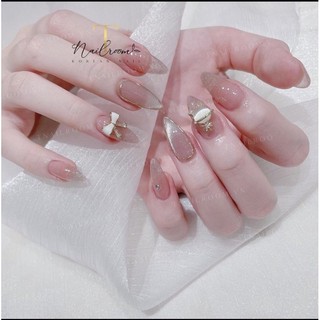 Mẫu nailbox móng up mắt mèo đính nơ và charm