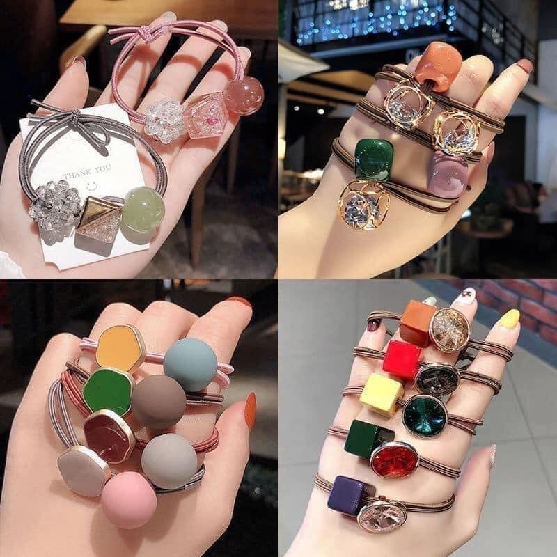 Dây buộc tóc , Set 20 chun buộc tóc túi nhựa trong mix nhiều hình dễ