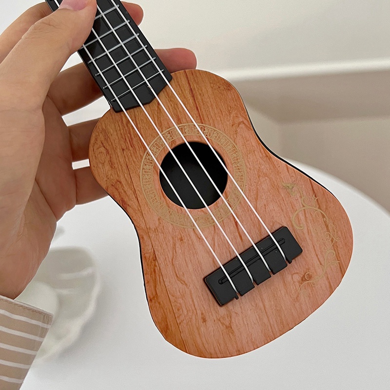 Đồ Chơi Mô Hình Đàn Ukulele Mini Để Bàn Trang Trí Cho Bé
