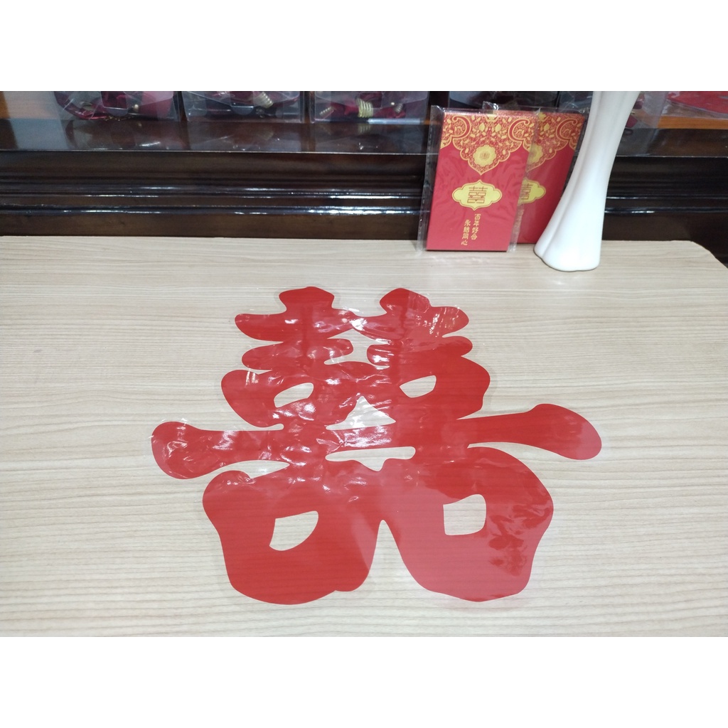 Chữ Hỷ dán kính xe dán kiếng