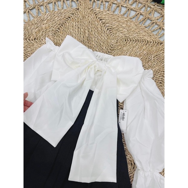 Set chân váy tennis + áo bẹt vai nơ to