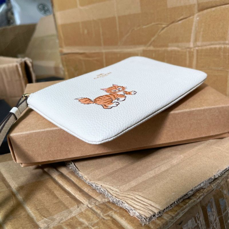 Ví coach đeo cổ tay siêu cưng