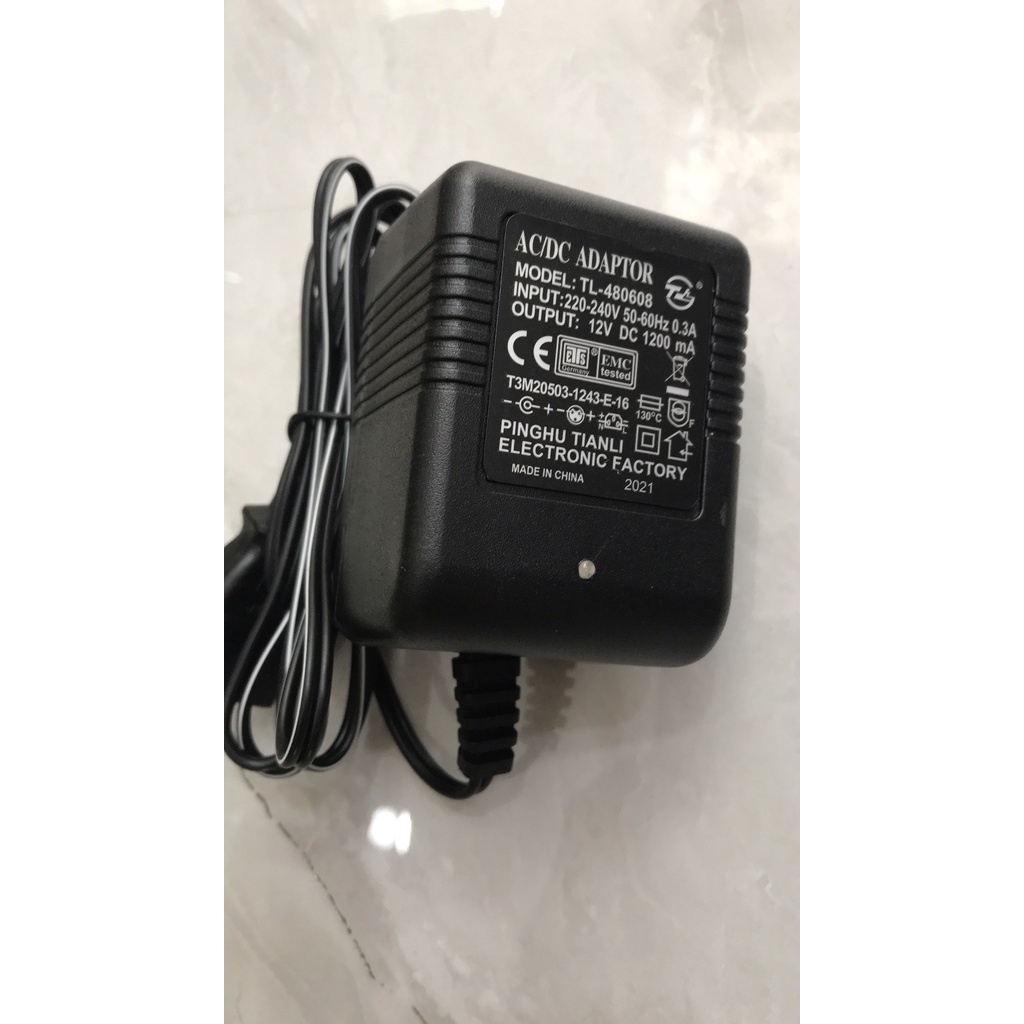 Cục Sạc 12v bình xịt điện 1200mA loại cơ tốt