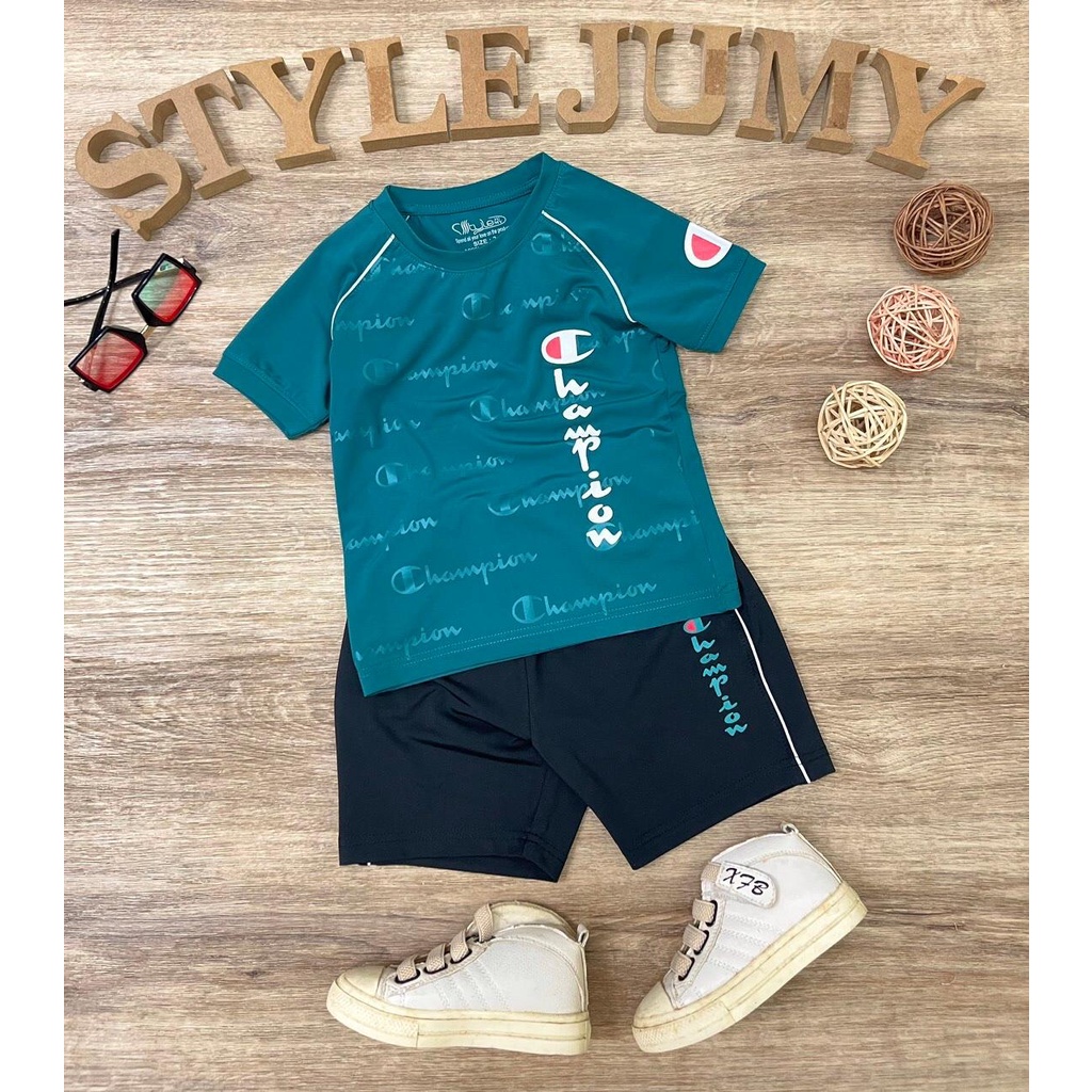 Size 7- 12 ( 24-45kg) - Bộ quần áo thể thao ngắn tay cho bé trai vải thun lạnh in chữ CHAM-PI-ON dọc